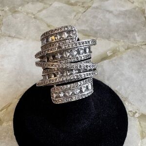 Sterling Silver6.4 CT cubic Zirconia Cocktail Ring.
Measures 1.25” long. Sparkle